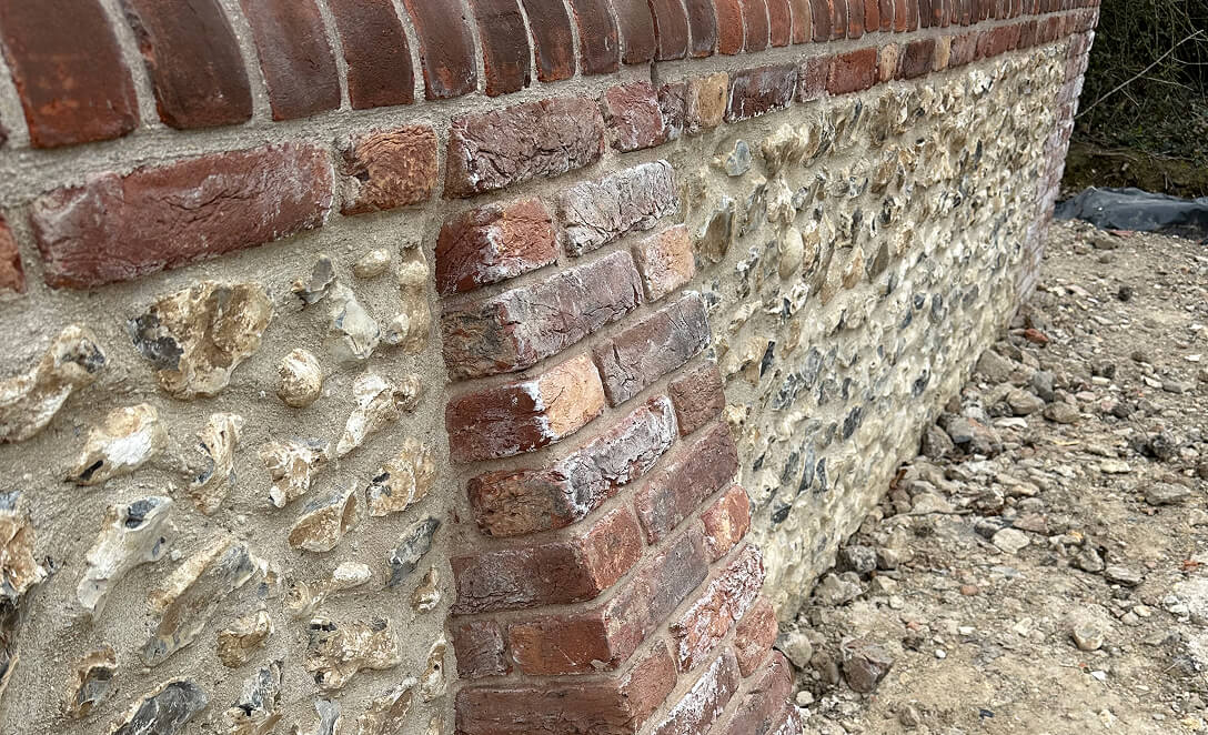 Flint and brick corner masonry detail