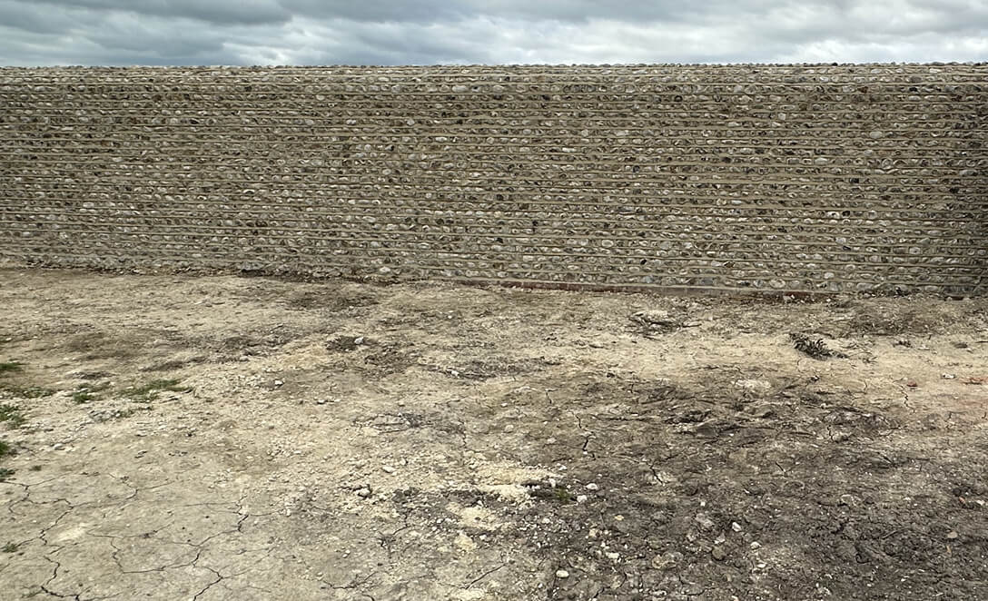 Flint stone boundary wall construction