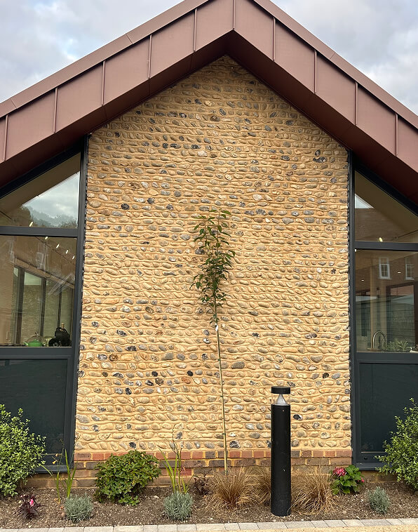 Modern flint clad house facade