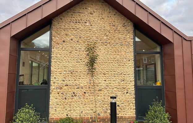 Modern flint clad house facade